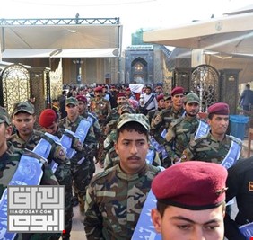 فرقة الامام علي القتالية تجري استعراضًا عسكريًا في النجف