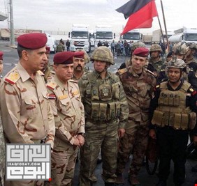 الغانمي يرفع العلم العراقي على معبر فيشخابور