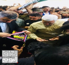 ابو مهدي المهندس ومحمد الدراجي يكرمان جرحى الحشد في مهرجان الشهادة والنصر  بالنجف
