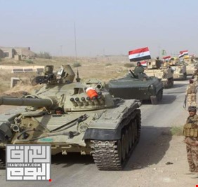 الجيش العراقي يبدأ بأنزال اعلام الـ ppk من سنجار العراقية