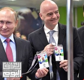 بوتين وإنفانتينو يتسلمان بطاقة 