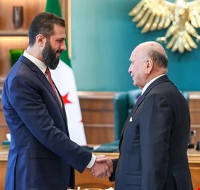 فؤاد حسين يبحث في دمشق مع الرئيس السوري المؤقت تعزيز التنسيق بين البلدين لمواجهة التحديات المشتركة