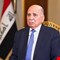 العراق يرفض الانجرار للحرب.. فؤاد حسين يكشف ضغوطاً خارجية ويعلن بدء تسليم السلاح من 3 فصائل