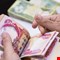 المالية تعلن المباشرة بتمويل رواتب موظفي الدولة لشهر تموز