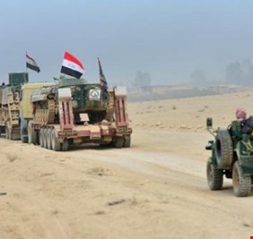 العلم العراقي يرفرف فوق ستة أحياء في الجانب الأيسر للموصل