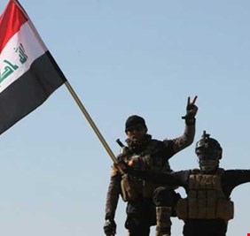 القوات الأمنية تدخل مركز ناحية حمام العليل وترفع العلم العراقي فوق مبانيه