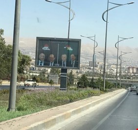 انتشار صور العبادي والمالكي في شوارع السليمانية بكردستان