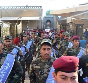 فرقة الامام علي القتالية تجري استعراضًا عسكريًا في النجف