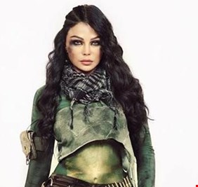 لماذا تحمل هيفاء وهبي دائماً سلاحاً نارياً في حقيبتها؟