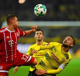 بايرن يهزم دورتموند 3-1 ويوسع الفارق لأربع نقاط