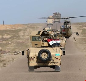 بمشاركة الطيران الحربي العراقي، عملية أمنية واسعة، وفرض حظر التجول في اربعة احياء بالموصل