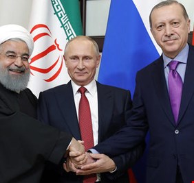 بوتن يسقط كرسي اردغان ويسلم على روحاني