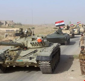 الجيش العراقي يبدأ بأنزال اعلام الـ ppk من سنجار العراقية