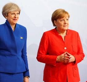 ماي وميركل تتفقان على 