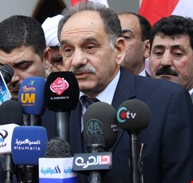 بعد مرور خمس سنوات على السرقة، بدر تطالب بإصدار مذكرة قبض ضد المطلك لـ”سرقته” أموال النازحين