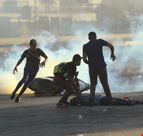 تقرير بريطاني: خبراء يرجحون عودة العراق إلى البند السابع في حال استمرار قمع المحتجين