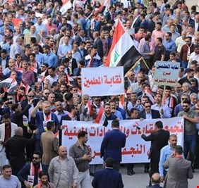 رد ناري من متظاهري النجف على وثيقة الشرف التي وقعتها القوى السياسية في منزل الحكيم