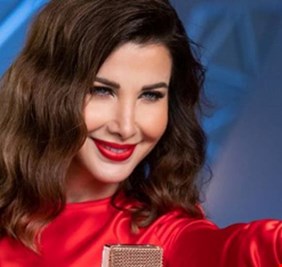 نانسي عجرم تحقق 100 مليون استماع ومشاهدة على تطبيق 