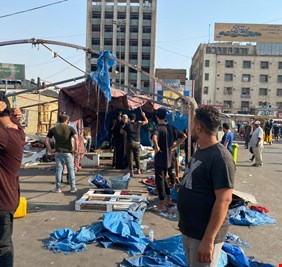 هل ثمة اتفاق سياسي وراء رفع خيم المعتصمين من ساحة التحرير؟