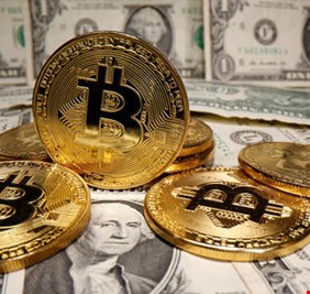 بيتكوين تحقق أعلى سعر لها على الإطلاق مقابل الدولار