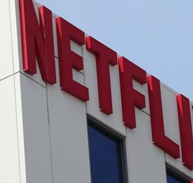 تنصيب بايدن ونتفليكس يقفزان بالأسهم الأمريكية لمستويات قياسية