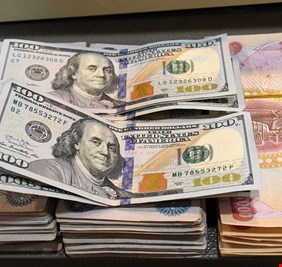 المستشار المالي للكاظمي يكشف عن خطة للسيطرة على سعر الدولار امام الدينار