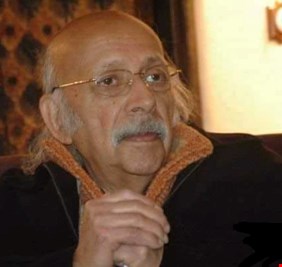 بالفيديو .. مظفر النواب يتحدث عن لقائه بصدام حسين.. ما قصة المسدس الذي قدمه الطاغية للشاعر الراحل؟