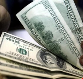 انخفاض طفيف بأسعار الدولار في بورصة العراق: 157 ألف دينار للورقة