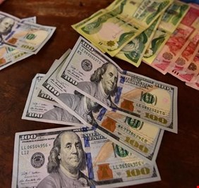 أسعار الدولار بالعراق تسجل أكثر من 163 ألف دينار للورقة