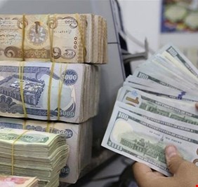 مرجع ديني يفتي بحرمة بيع الدولار بسعر السوق الموازي