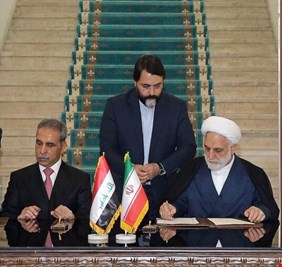 العراق و إيران يوقعان مذكرة تفاهم في الشأن القضائي