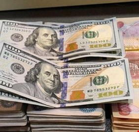 الدولار الأمريكي يشهد انخفاضاً امام الدينار العراقي في بغداد
