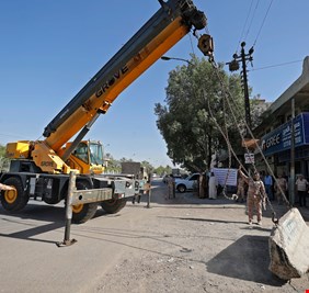 العراق يرفع 70 بالمائة من الحواجز الأمنية في شوارع بغداد