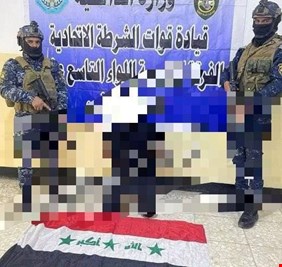 اعتقال شخص رفع علم صدام فوق منزله ببغداد