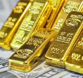 الذهب يتراجع مع صعود الدولار وتفاؤل باتفاق أميركا والصين
