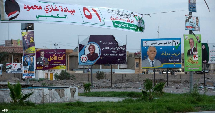 مفوضية الانتخابات تباشر برفع دعاية المرشحين قرب مراكز الاقتراع