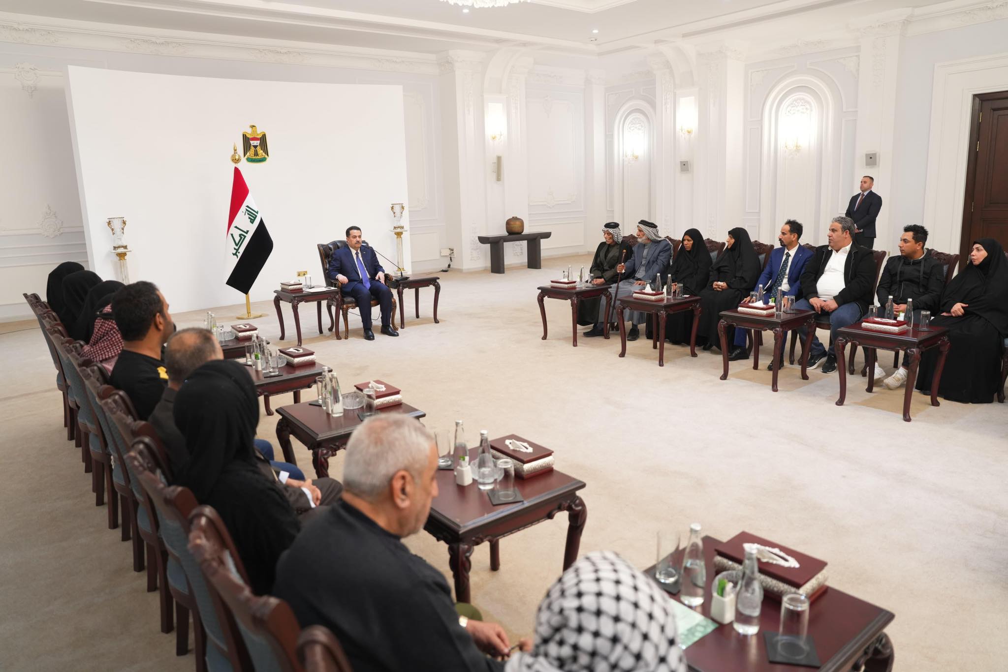 السوداني يؤكد حرص الحكومة على خدمة عوائل الشهداء و توزيع قطع الأراضي السكنية