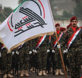 فصيل عراقي : مشروع دمج الحشد الشعبي مع القوى الأمنية “أميركي”